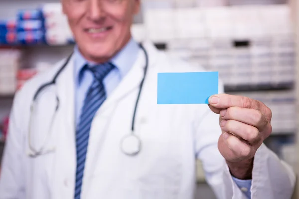 Pharmacist holding a prescription — Stock Photo, Image