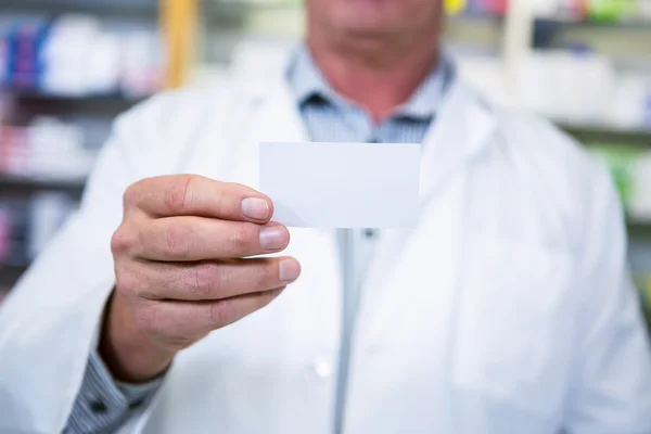 Pharmacist holding a prescription — Stock Photo, Image