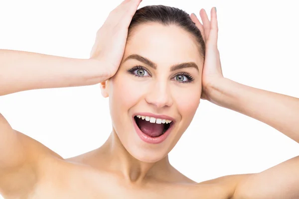 Woman posing with shocked expression — Stock Photo, Image