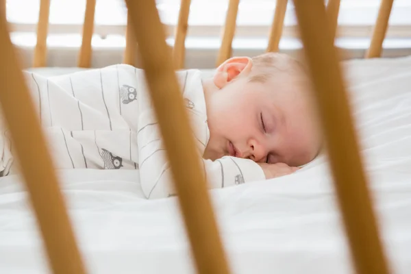 Baby boy sleeping on a cradle — Stock Photo, Image