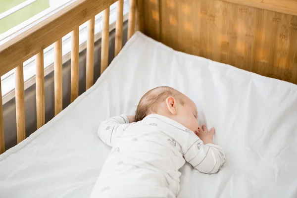 Baby boy sleeping on a cradle — Stock Photo, Image