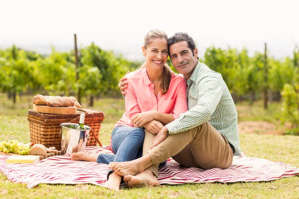 Couple relaxing on a blanket — Stock Photo, Image