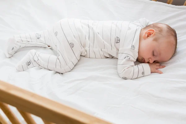 Baby boy sleeping on a cradle — Stock Photo, Image