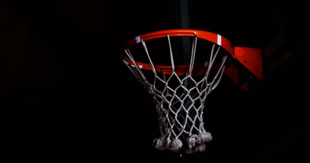 Basketball going through hoop — Stock Video