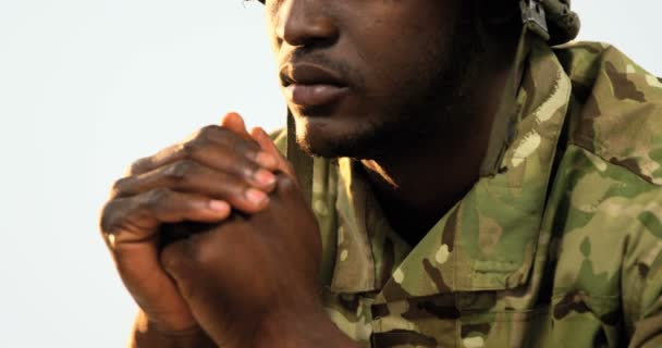 Thoughtful military soldier sitting — Stock Video