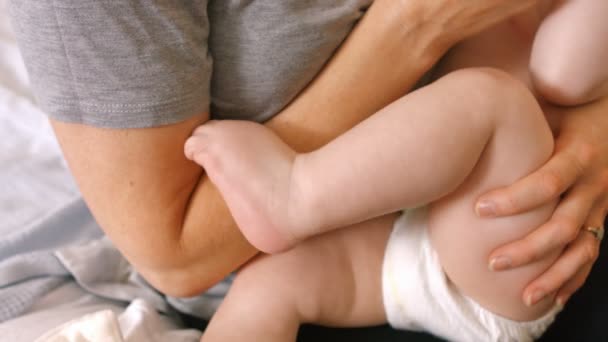 Mother feeding milk to her baby — Stock Video