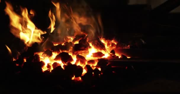 Burning fire at fireplace for blacksmith work — Stock Video