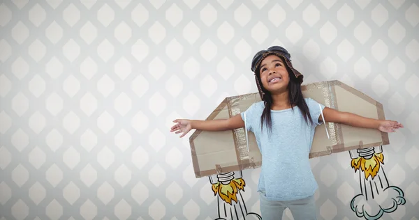 Girl with fake wings pretending to be pilot — Stock Photo, Image