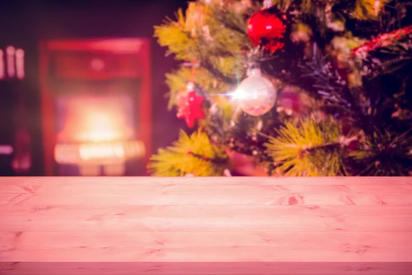 Wrapped gifts near a christmas tree — Stock Photo, Image