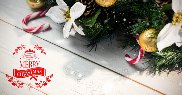 Saudação de Natal contra decorações — Fotografia de Stock