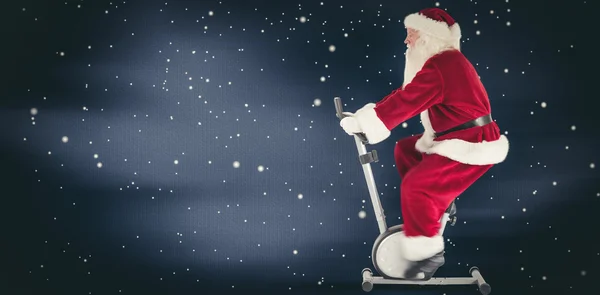 Babbo Natale utilizza un home trainer — Foto Stock