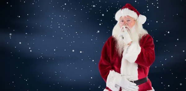 Santa vragen voor een rustige naar camera — Stockfoto