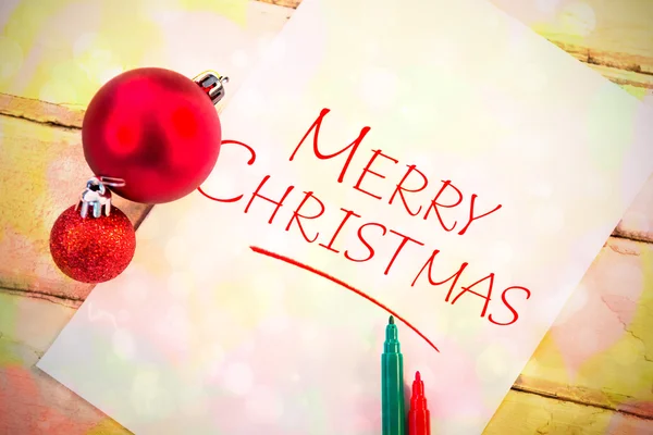 Småsak julgranskulor kände penna och papper — Stockfoto
