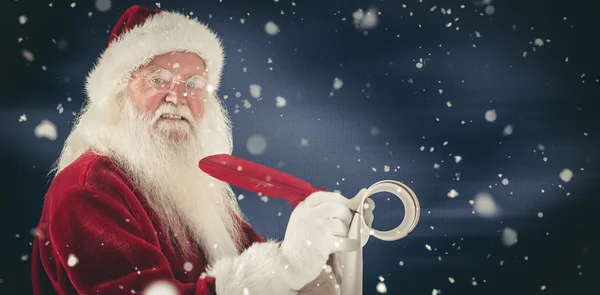 Father christmas writes a list — Stock Photo, Image