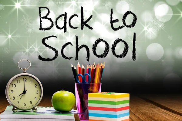 Back to school text with school materials — Stock Photo, Image