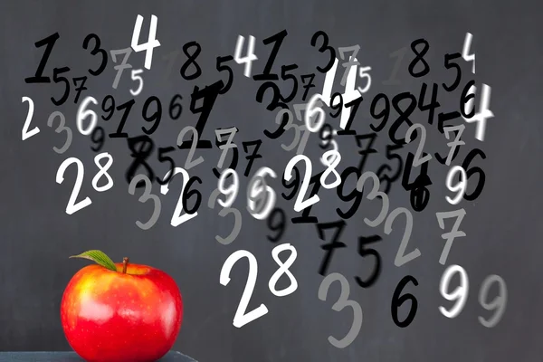 Červené jablko a náhodných čísel — Stock fotografie