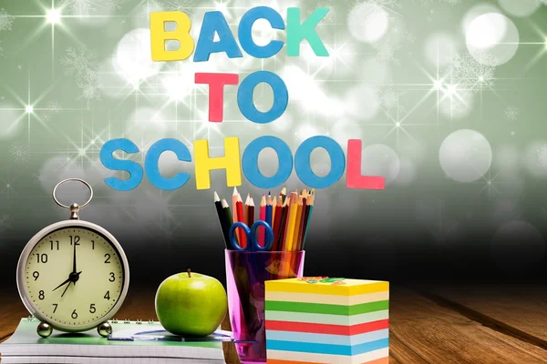 Back to school text with school materials — Stock Photo, Image