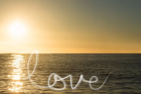 Text love on sea background — Stock Photo, Image