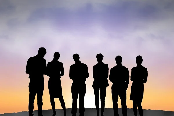 Silhouette of a business team — Stock Photo, Image