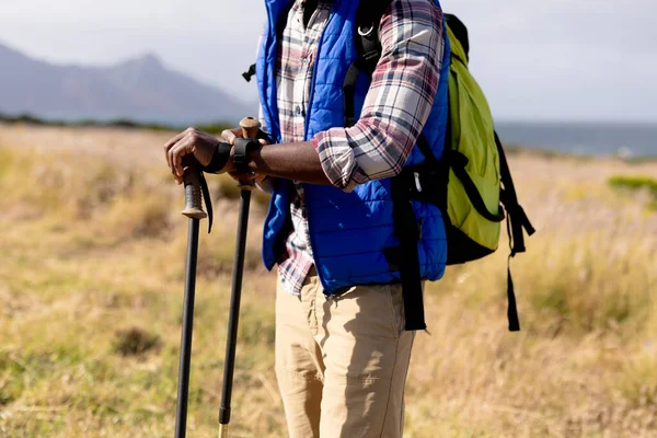 Fit African American Man Wearing Backpack Nordic Walking Coast Healthy — Stockfoto