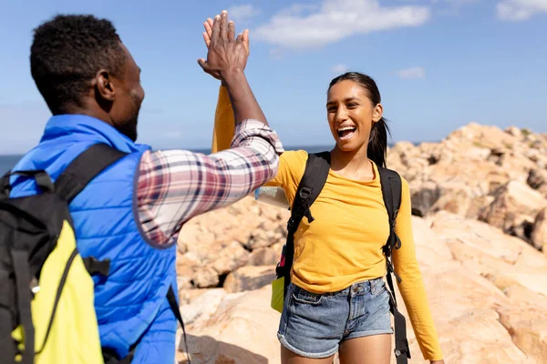 Fit African American Couple Wearing Backpacks High Fiving Hiking Coast — Stock Photo, Image