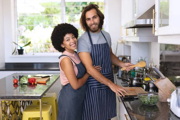 Portrait Happy Diverse Couple Kitchen Preparing Food Embracing Staying Home — Stock Photo, Image