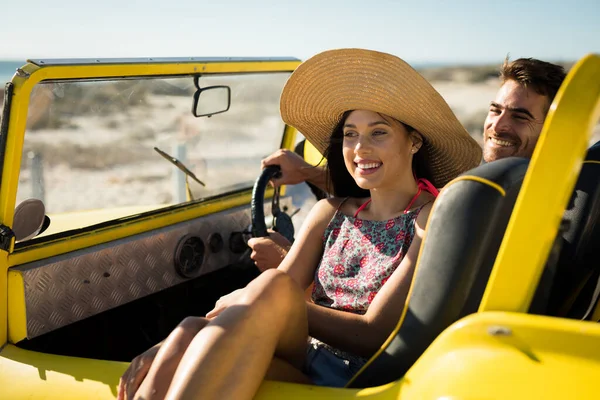 Happy Caucasian Couple Sitting Beach Buggy Sea Looking Ahead Beach — Stock Photo, Image