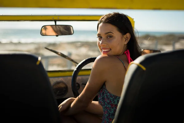 Happy Caucasian Woman Sitting Beach Buggy Sea Looking Camera Beach — Stock Photo, Image