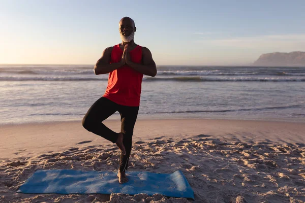 Senior African American Man Folded Hands Meditating Practicing Yoga Beach — Stock Photo, Image