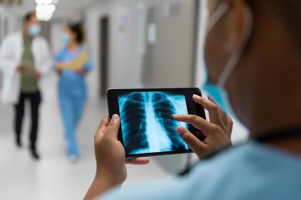 Mixed Race Doctor Corridor Wearing Face Mask Looking Lung Ray — Stock Photo, Image