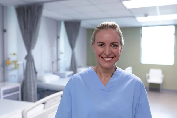 Portrait Smiling Caucasian Female Doctor Hospital Wearing Scrubs Medical Professional — Stock Photo, Image
