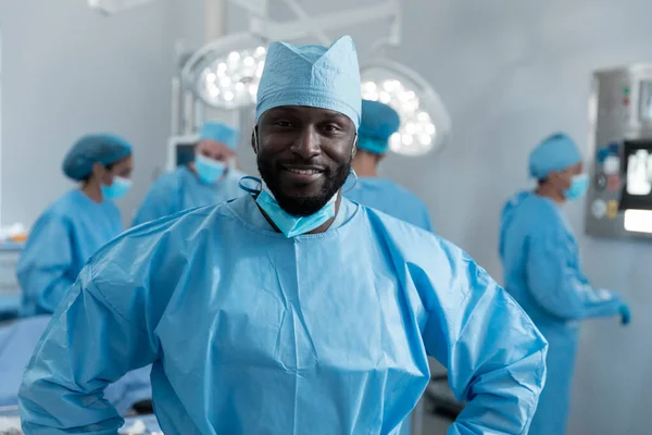 Smiling African American Male Surgeon Face Mask Protective Clothing Operating — Stock Fotó