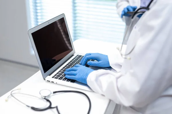 Midsection Doctor Wearing Latex Gloves Using Laptop Copy Space Screen — Stock Photo, Image