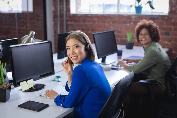 Happy Diverse Male Female Colleagues Sitting Front Computers Wearing Headsets — Stock Photo, Image