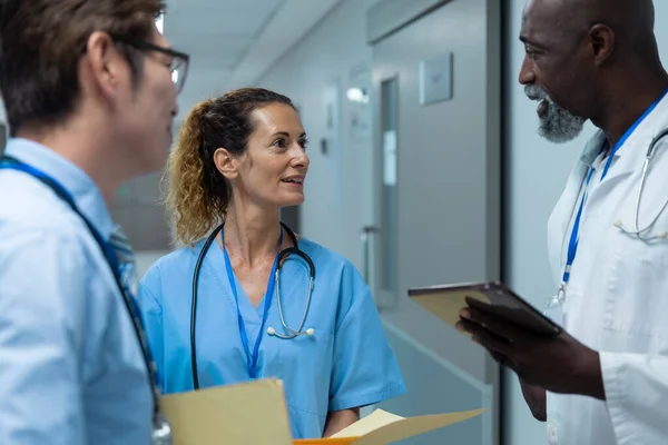 Diverse Group Male Female Doctors Standing Discussing Corridor Medicine Health — ストック写真