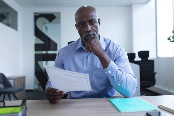 Portrait African American Businessman Sitting Desk Holding Documents Having Video — Stock Photo, Image