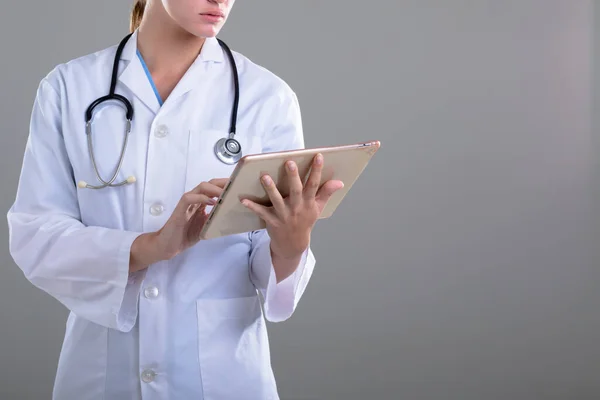 Midsection Caucasian Female Doctor Using Tablet Isolated Grey Background Concepto — Foto de Stock