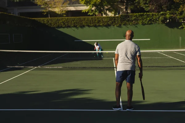 Senior African American Couple Playing Tennis Tennis Court Retirement Active — Stok fotoğraf