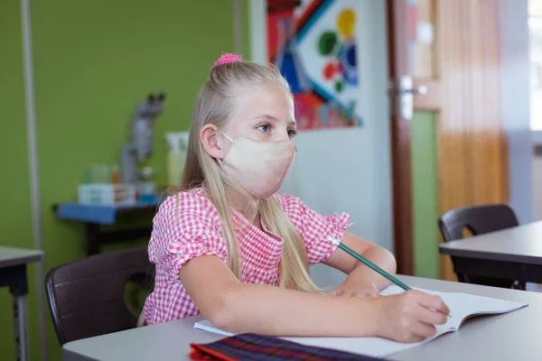 Caucasian Schoolgirl Sitting Desk Classroom Wearing Face Mask Lesson Childhood — Stock Photo, Image