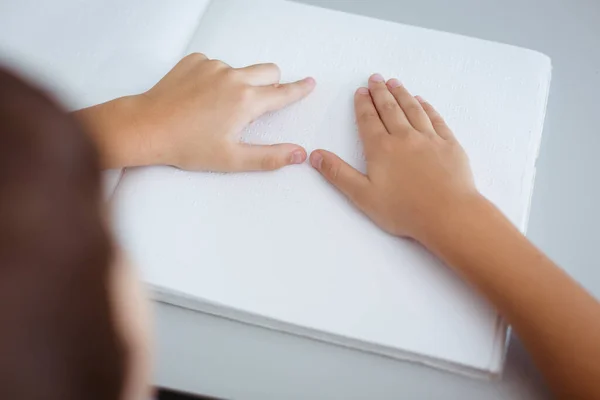 Blind Caucasian Schoolboy Sitting Desk Reading Braille Book Fingers Childhood — Stock Photo, Image