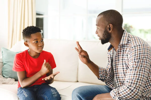 Happy African American Father Son Sitting Couch Living Room Talking — Stock Photo, Image