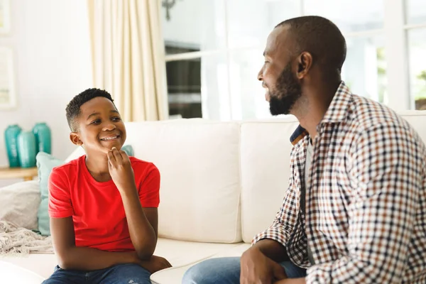 Happy African American Father Son Sitting Couch Living Room Talking — Stock Photo, Image
