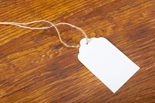 Σύνθεση Λευκής Κάρτας Ετικέτας Αντιγραφικό Χώρο Ξύλινο Φόντο Χριστούγεννα Παράδοση — Φωτογραφία Αρχείου