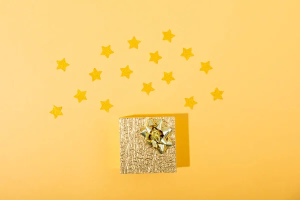 Composition Gold Christmas Present Stars Yellow Background Christmas Tradition Celebration — Stock Photo, Image