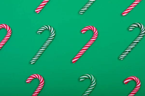 Composition Multiple Green Red Candy Canes Green Background Christmas Tradition — Stock Photo, Image