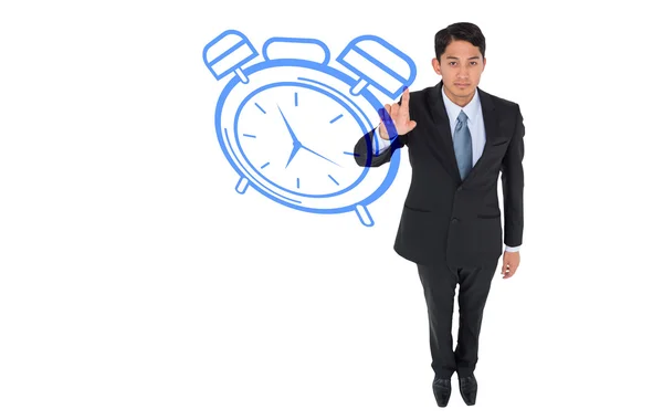 Asiático hombre de negocios apuntando azul reloj —  Fotos de Stock