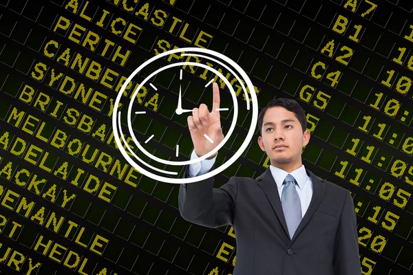 Empresario señalando el reloj blanco — Foto de Stock