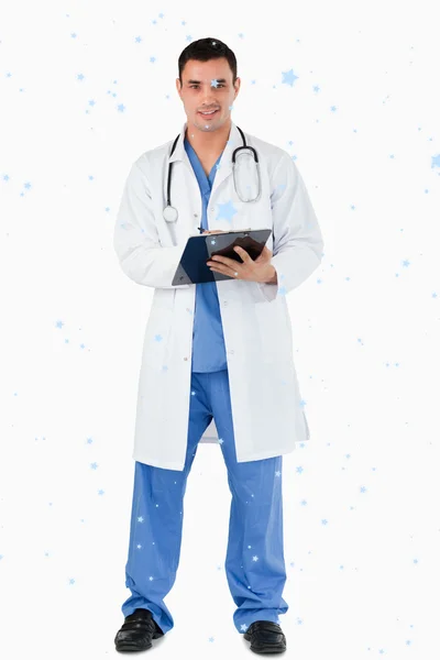 Composite image of doctor with a clipboard — Stock Photo, Image
