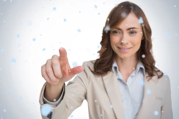 Businesswoman pointing her finger at camera — Stock Photo, Image