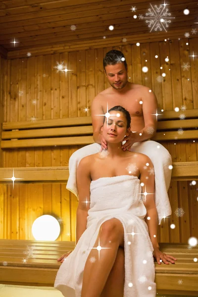 Man giving his girlfriend neck massage — Stock Photo, Image